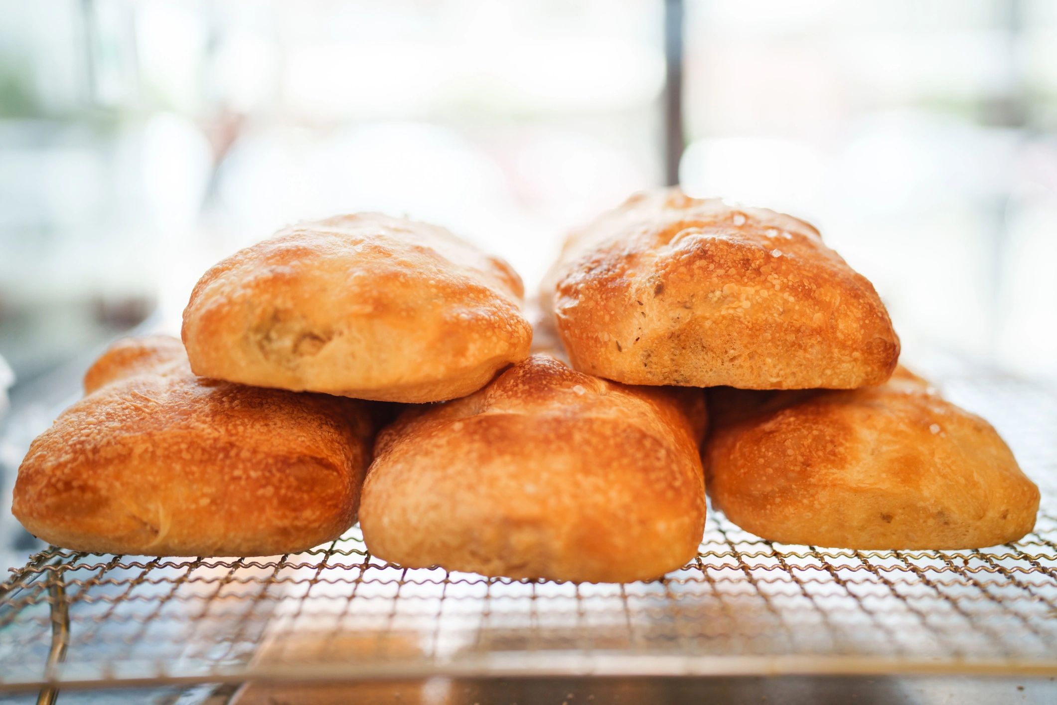 Freshly baked bread loaves in a bakery display